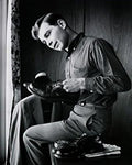 Posterazzi Side profile of a teenage boy polishing his shoes Poster Print, (18 x 24)