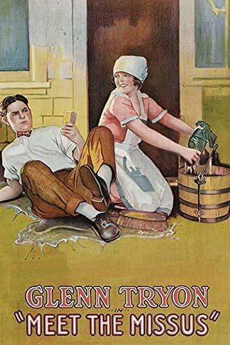 Young Couple on Floor she has scrubbing brush and wash tub with laundry Poster Print by Unknown (18 x 24)