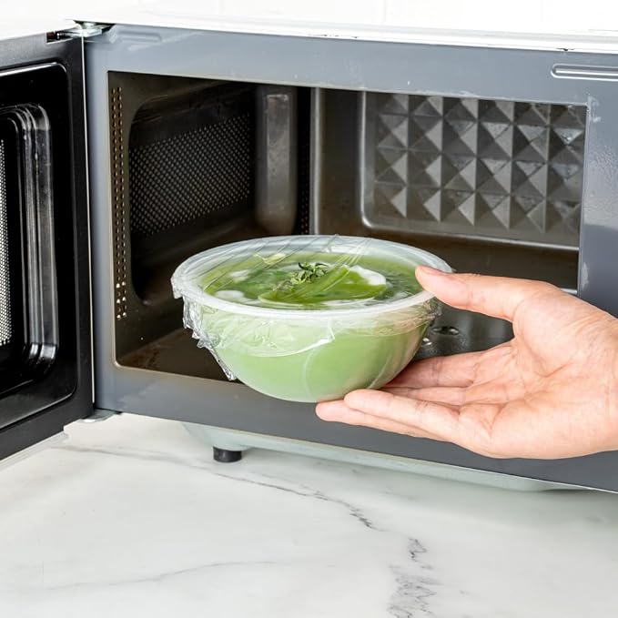 Restaurantware Basic Nature 12" x 200' Food Wrap 1 Microwavable Cling Wrap - With Built-In Slide Cutter Freezable Clear Plastic Kitchen Food Wrap Durable For Restaurant Cafes And Delis