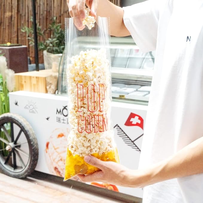 Restaurantware-Bag Tek 17 x 7 Inch Popcorn Bags, 100 Greaseproof Popcorn Favor - Hot & Cold Friendly, Freezable, Clear PE Plastic Carnival, For Event Favors Or Goodie Bags
