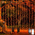 JMEXSUSS 300LED Orange Halloween Curtain Lights with Remote, 9.8x9.8ft