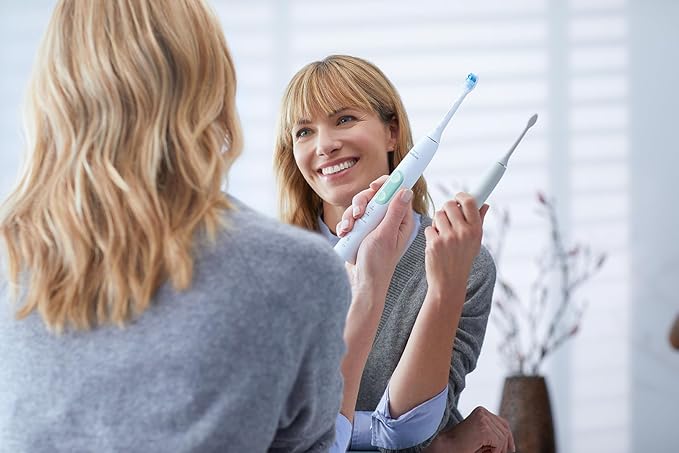 Philips Sonicare ProtectiveClean 5100 Rechargeable Electric Toothbrush, with Pressure Sensor, 3 Cleaning Modes, SmarTimer and QuadPacer, 14-Day Battery Life, Travel Case, White, Model HX6857/11