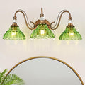 Vintage Bathroom Vanity Light, 3-Light Matte Antique Brass Finish Wall Sconce with Hanging Crystal Accents and Flower-Shaped Green Glass Shades, Retro Wall Mount Vanity Light Over Mirror for Bathroom