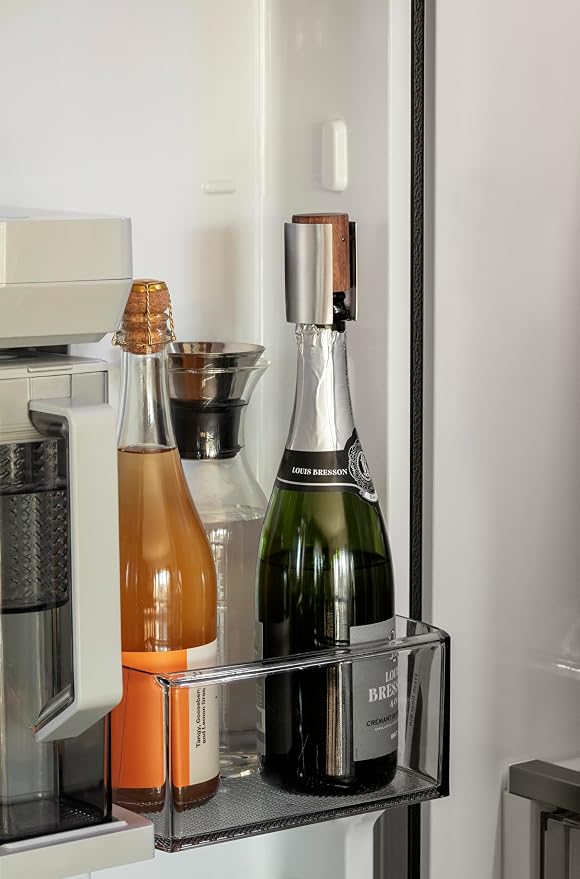 Eva Solo | Liquid lounge Champagne stopper |Keeps champagne fresh long after opening | Walnut wood