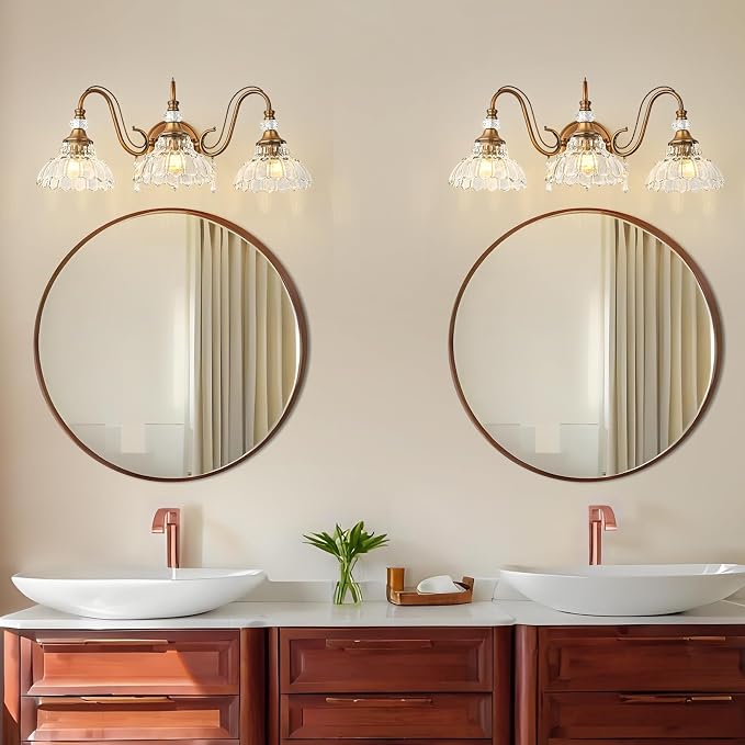 Vintage Bathroom Vanity Light, 3-Light Matte Antique Brass Finish Wall Sconce with Hanging Crystal Accents and Flower-Shaped Clear Glass Shades, Retro Wall Mount Vanity Light Over Mirror for Bathroom