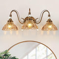 Vintage Bathroom Vanity Light, 3-Light Matte Antique Brass Finish Wall Sconce with Hanging Crystal Accents and Flower-Shaped Amber Glass Shades, Retro Wall Mount Vanity Light Over Mirror for Bathroom