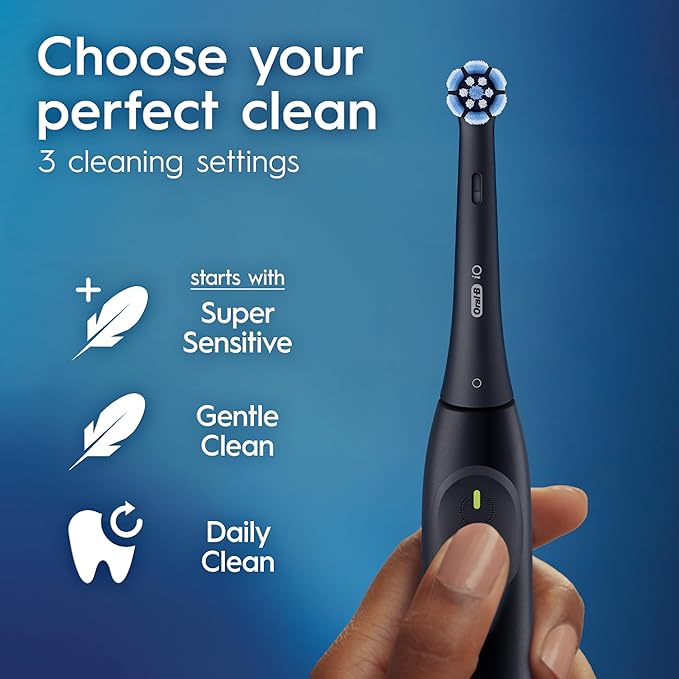 Oral-B Rechargeable Electric Toothbrush, iO2 Starter Kit, 3 Cleaning Modes, Automatic Pressure Sensor to Protect Gums, 2 Brush Heads, Night Black