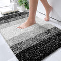 OLANLY Bathroom Rugs Mat 34x21, Extra Soft Absorbent Microfiber Bath Rugs, Rubber Backing, Quick Dry, Machine Washable Bath Mats for Bathroom Floor, Tub and Shower, Home Decor Accessories, Black