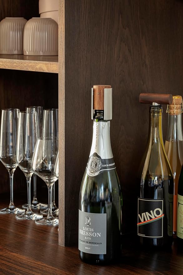 Eva Solo | Liquid lounge Champagne stopper |Keeps champagne fresh long after opening | Walnut wood