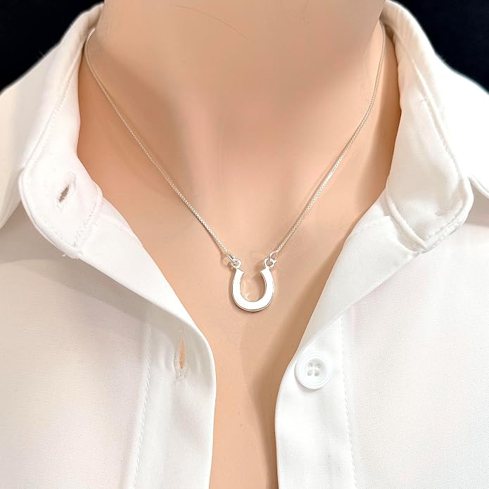 Sterling Silver Horseshoe Necklace for Women, Good Luck Equestrian Pendant | Polished horseshoe worn open side up to hold good fortune, suited to riders, equestrians, graduates, and new beginnings
