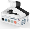 Plastic Hangers 50 Pack (60 Count) – Made in the USA – 6lb Capacity Standard Clothes Hangers with Strap Hooks for Dresses, Lingerie, Shirts, Pants, and Jackets – White & Black