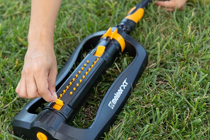 Melnor 65202AMZ CrossStream Turbo Oscillating Sprinkler, 4,000 Sq. Ft. Coverage, TwinTouch Width & Range Control, InfinityDrive™ Turbo Motor, Black, Orange