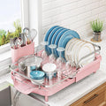 SNTD Dish Drying Rack, Expandable Dish Rack for Kitchen Counter, Stainless Steel Dish Drainer with Drainboard Set and Utensil Holder (Pink)